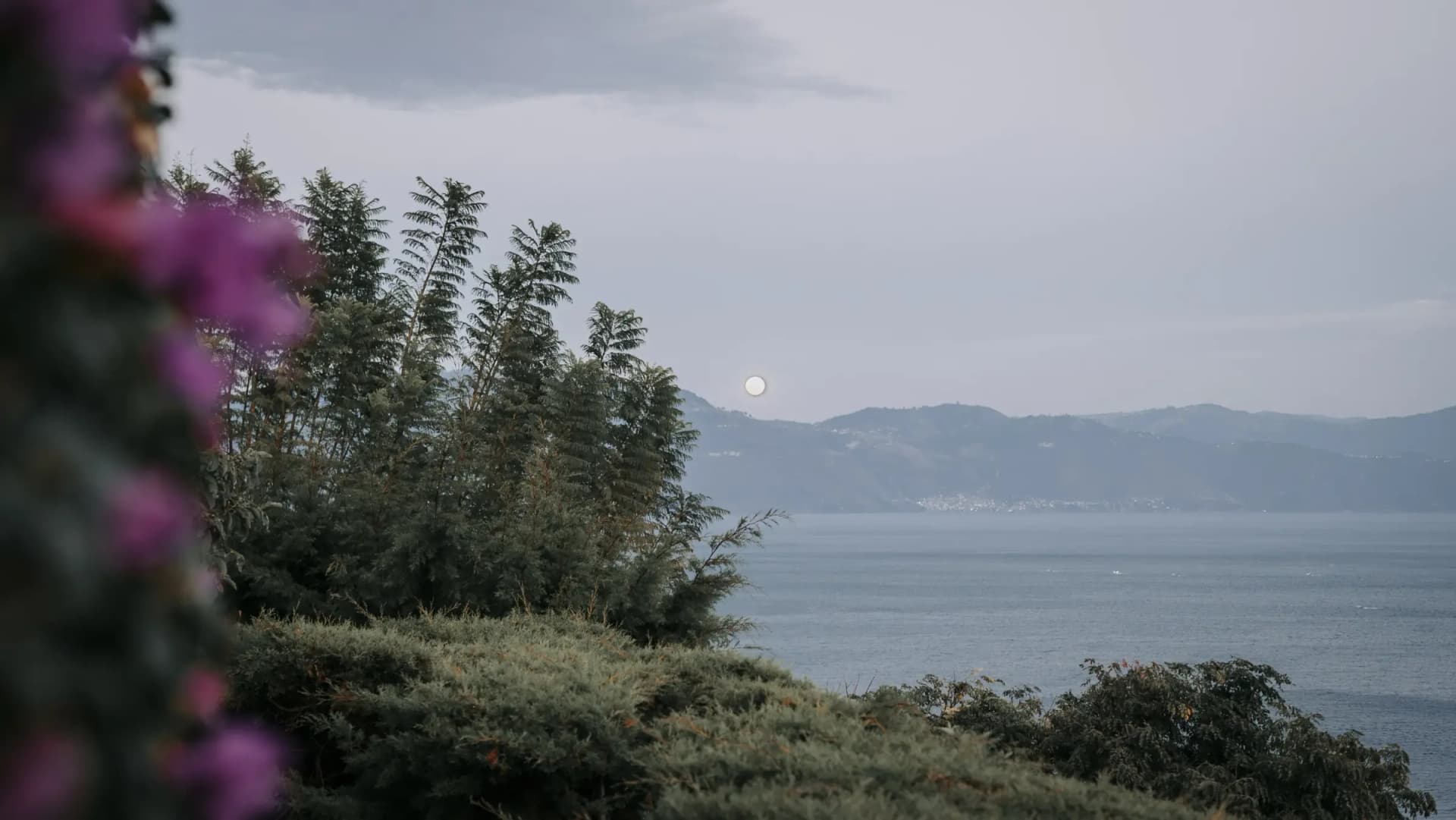 Stunning landscape view of Lake Atitlán and surrounding volcanoes