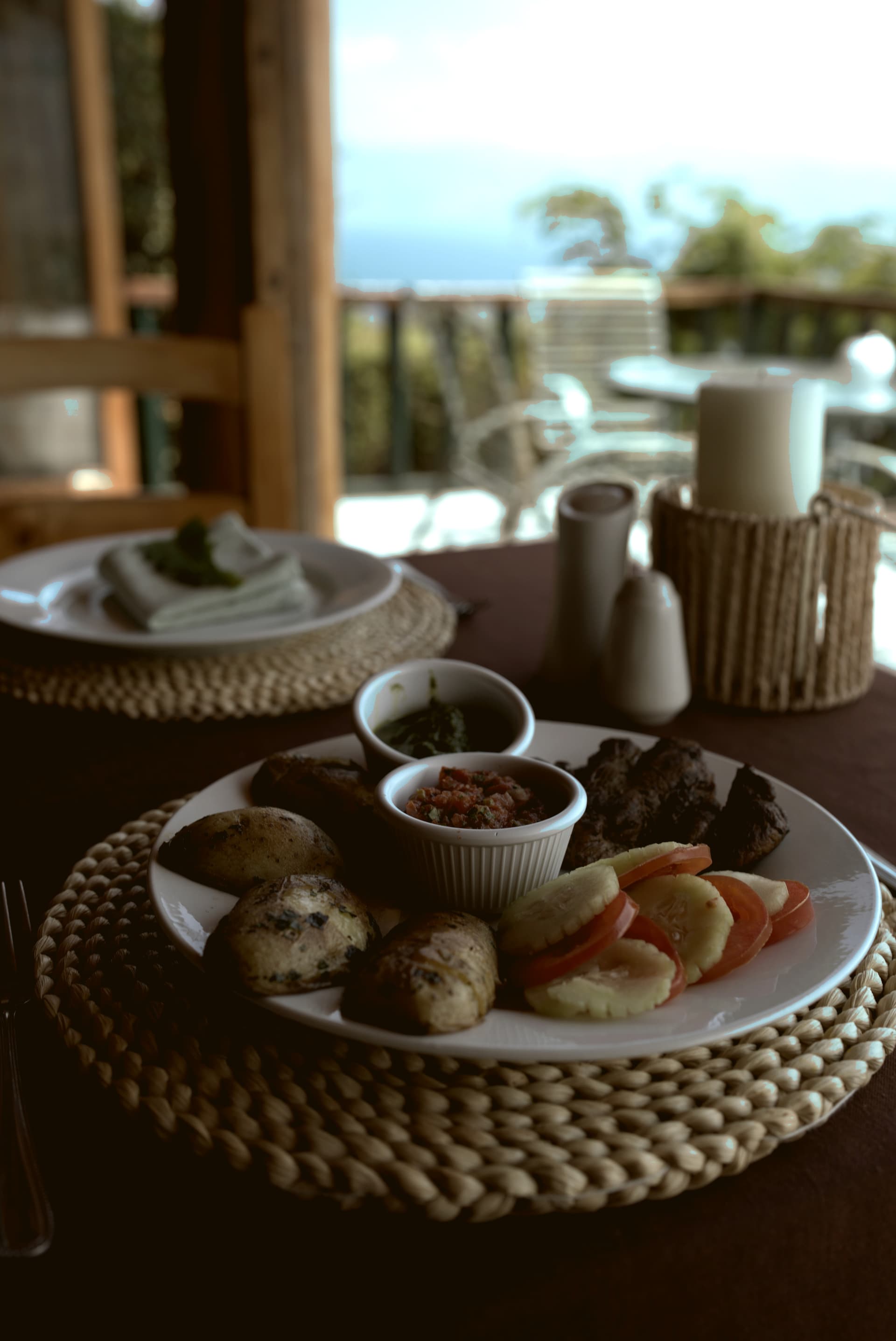 Breakfast plate with fresh fruit and lake view