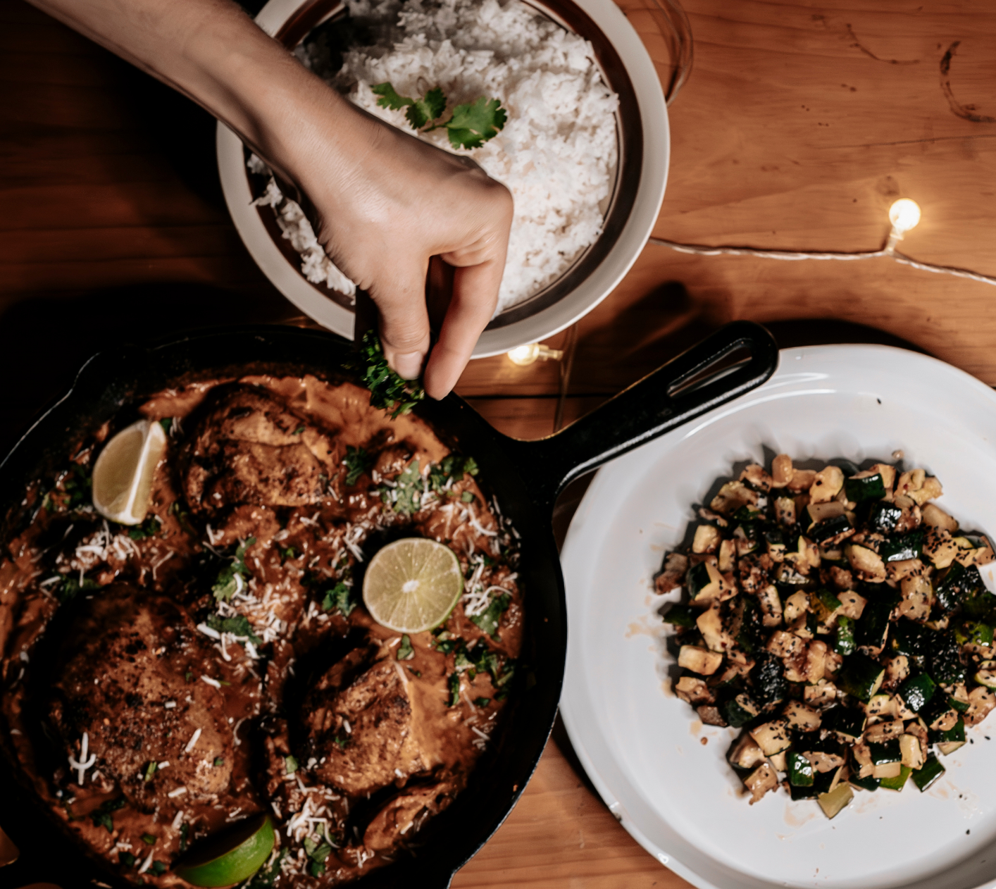 Overhead view of farm-to-table dishes at Loma de Atitlan with fresh local ingredients and candlelight